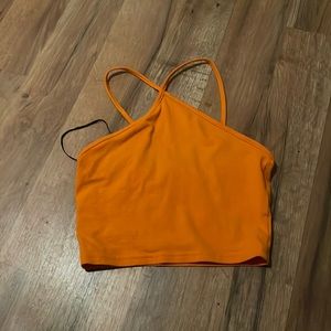 Orange divided cropped top. Color (orange) original price (25$)